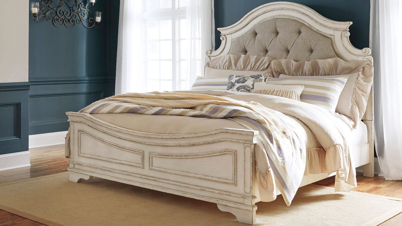 Room View of the Realyn King Size Upholstered Bed in Off White by Ashley Furniture | Home Furniture Plus Bedding