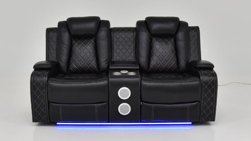 Lighted Front Facing View of the Orion Reclining Loveseat in Black by New Classic | Home Furniture Plus Bedding