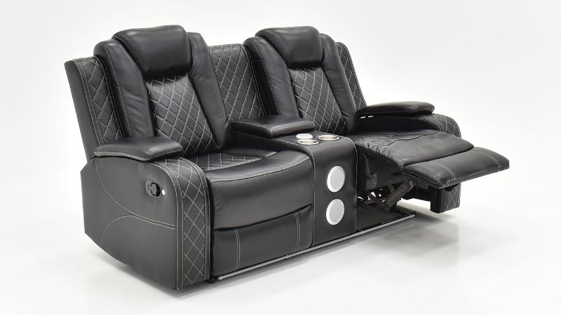 Angled View of the Orion Reclining Loveseat in Black by New Classic | Home Furniture Plus Bedding