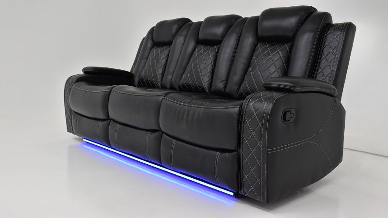 Theater Lighting on the Orion Reclining Sofa in Black by New Classic | Home Furniture Plus Bedding