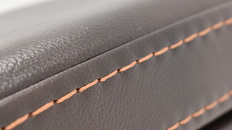 Close Up View of the Stitching on the Milan POWER Reclining Loveseat with Lights in Brown by Man Wah | Home Furniture Plus Bedding
