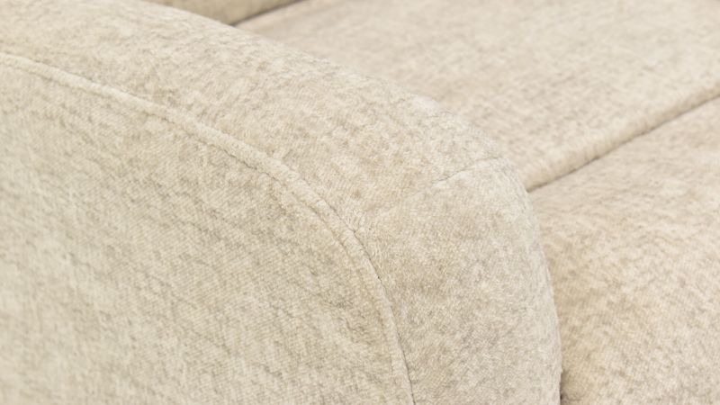Angled View of the Arm on the Stratus Swivel Gliding Recliner in Off-White by Franklin Corp. | Home Furniture Plus Bedding