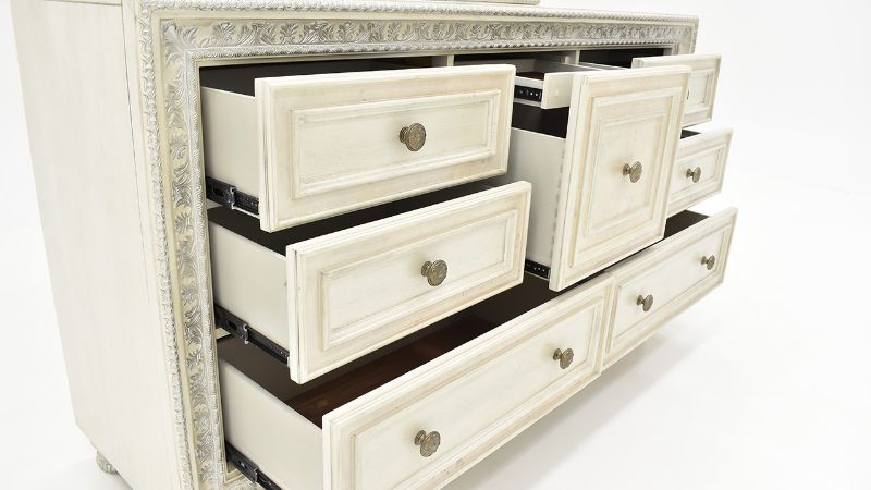Slightly Angled View of the Ava Dresser with Mirror in White with Drawers Open by Avalon Furniture | Home Furniture Plus Bedding