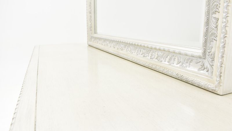 Slightly Angled View of the Mirror Frame on the Ava Dresser with Mirror in White by Avalon Furniture | Home Furniture Plus Bedding