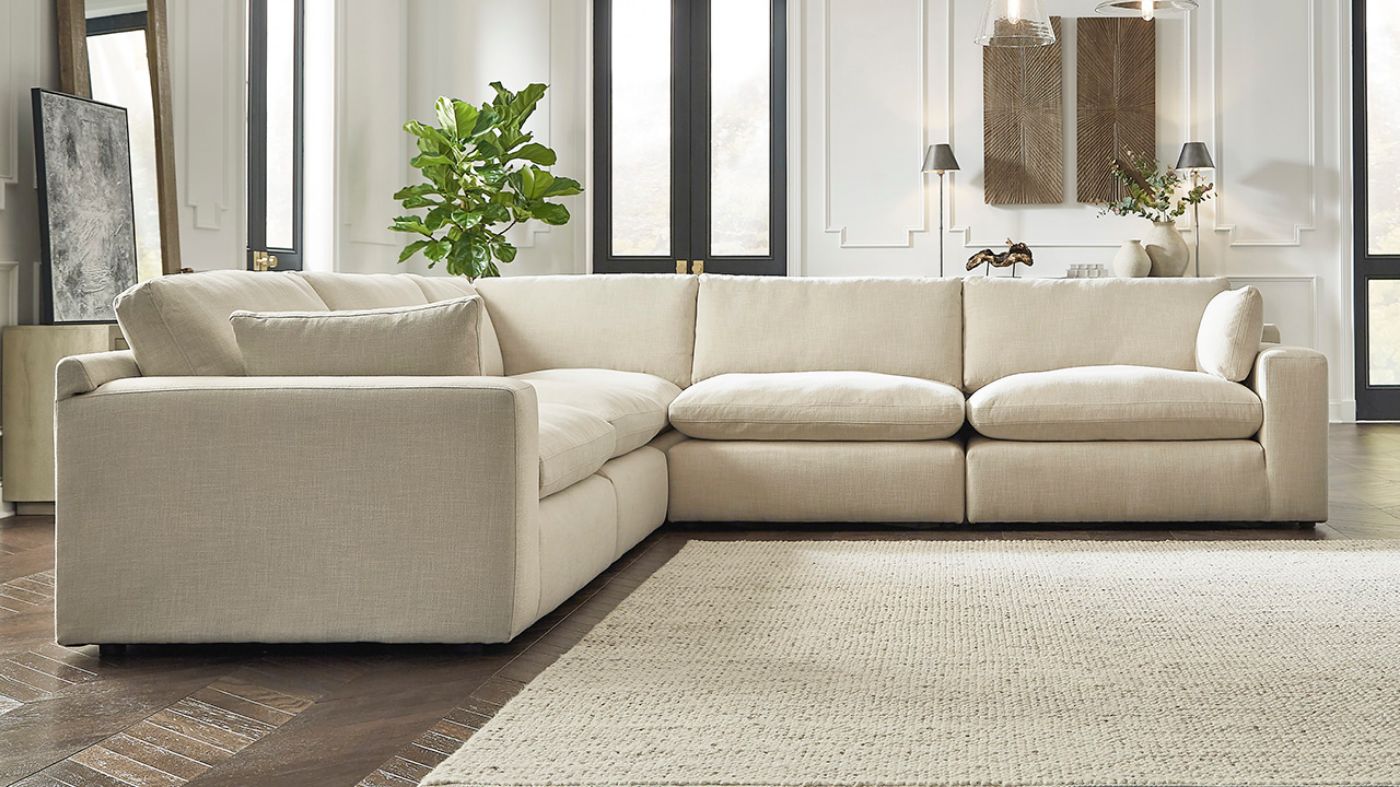 Room View of the Elyza Sectional Sofa in Off White by Ashley Furniture | Home Furniture Plus Bedding