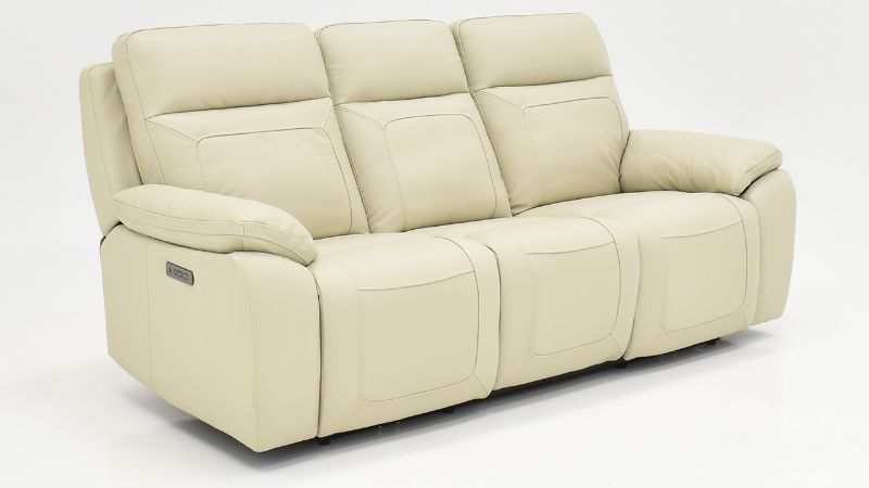 Angled View of the Dove POWER Reclining Sofa in Off White by Man Wah | Home Furniture Plus Bedding