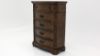 Angled View of the Tulsa Chest of Drawers in Light Brown by Avalon Furniture | Home Furniture Plus Bedding