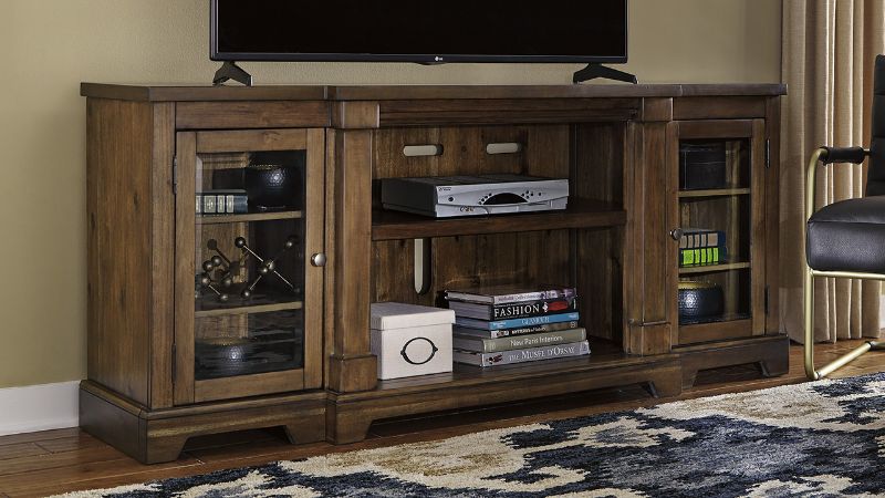 Room View of the Flynnter TV Stand in Brown by Ashley Furniture | Home Furniture Plus Bedding