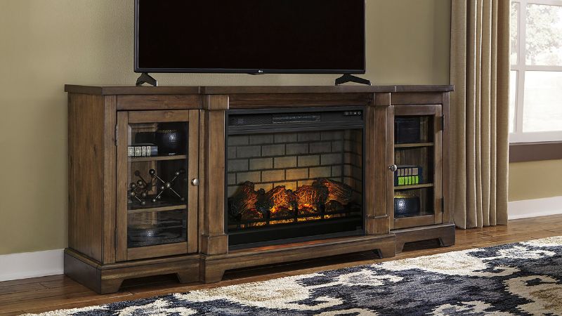 Room View of  the Flynnter TV Stand with Fireplace  in Brown by Ashley Furniture | Home Furniture Plus Bedding