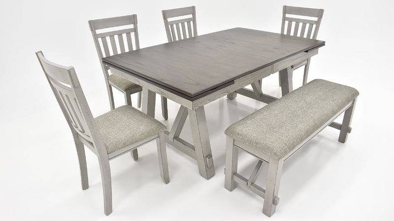 Angled View of the Newport 6 Piece Dining Table Set with Bench in Gray by Liberty Furniture | Home Furniture Plus Bedding