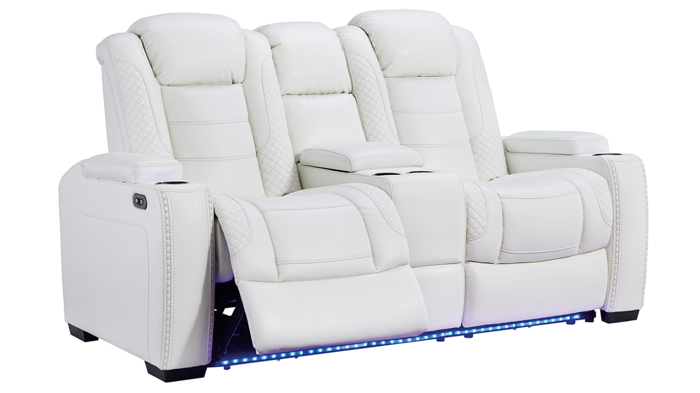 Angled View of the Party Time POWER Reclining Loveseat in White by Ashley Furniture | Home Furniture Plus Bedding