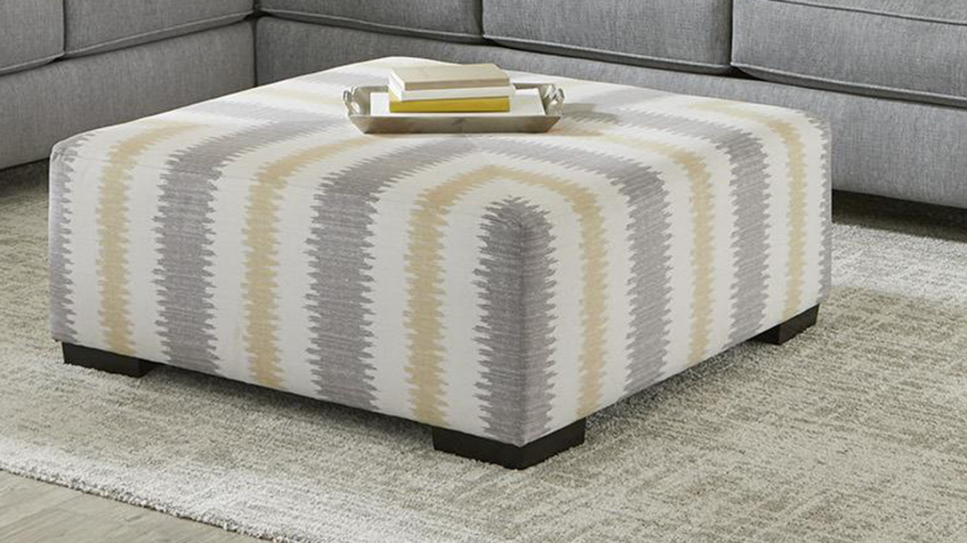 Room View of the Stonewash Ottoman in Gray by Albany Industries | Home Furniture Plus Bedding