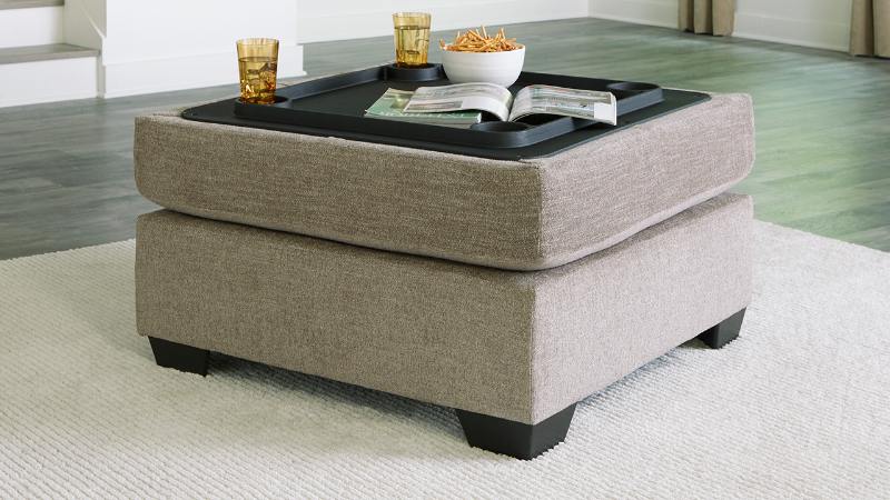 Room View of the Creswell Storage Ottoman in Stone Gray by Ashley Furniture | Home Furniture Plus Bedding