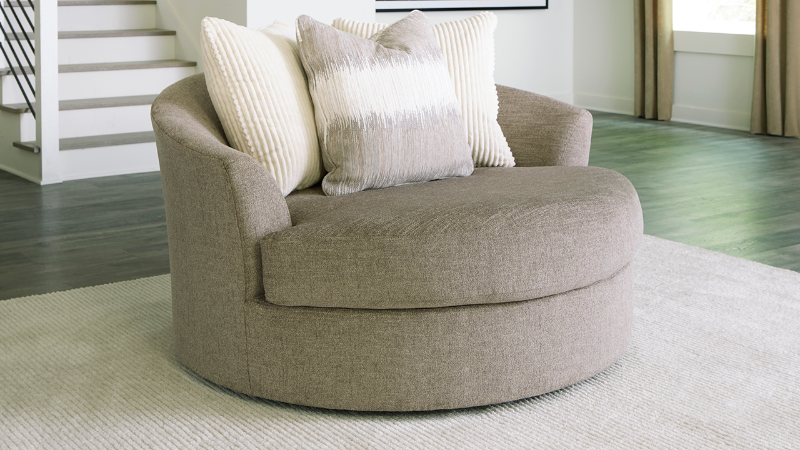 Room View of the Creswell Swivel Chair in Stone Gray by Ashley Furniture | Home Furniture Plus Bedding 