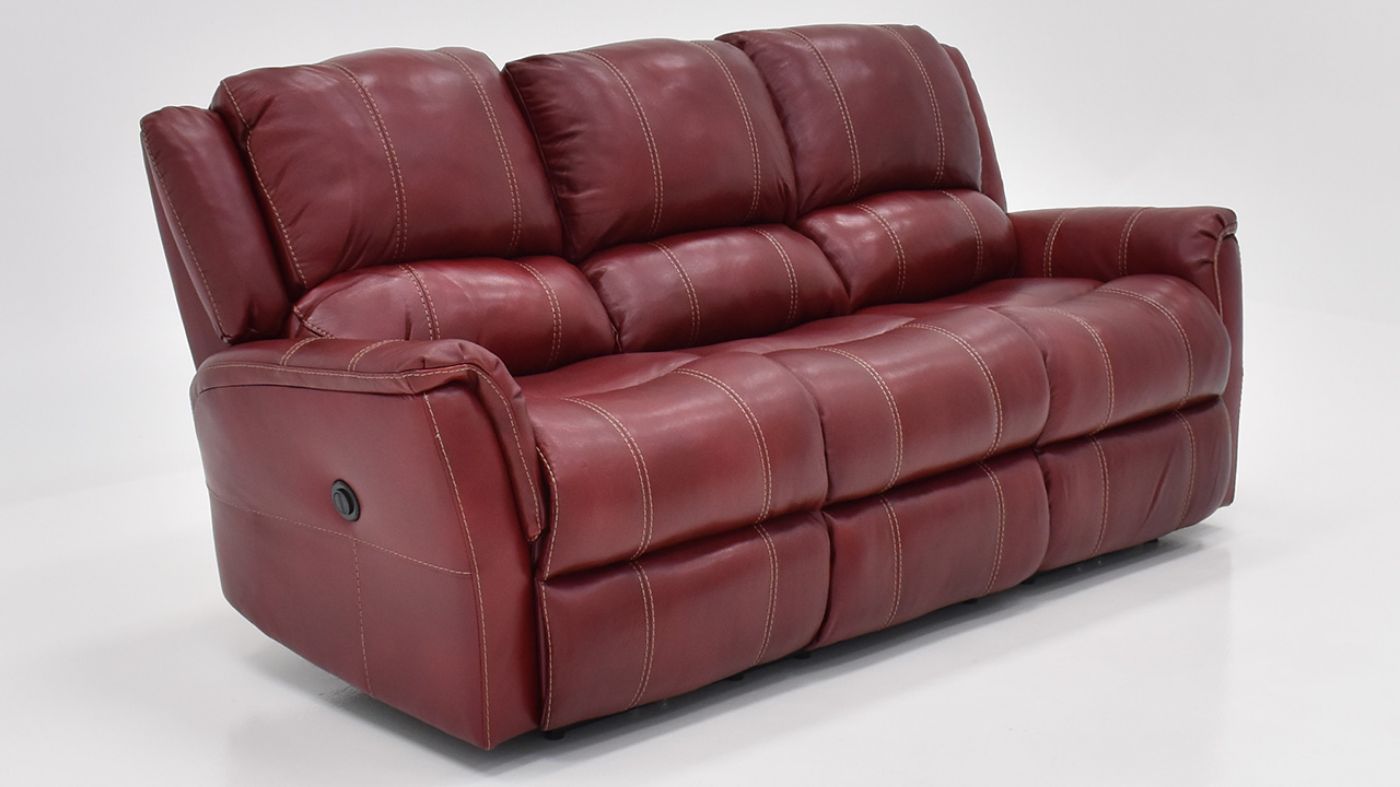 Angled View of the Mercury POWER Reclining  Leather Sofa in Merlot Red by HomeStretch | Home Furniture Plus Bedding