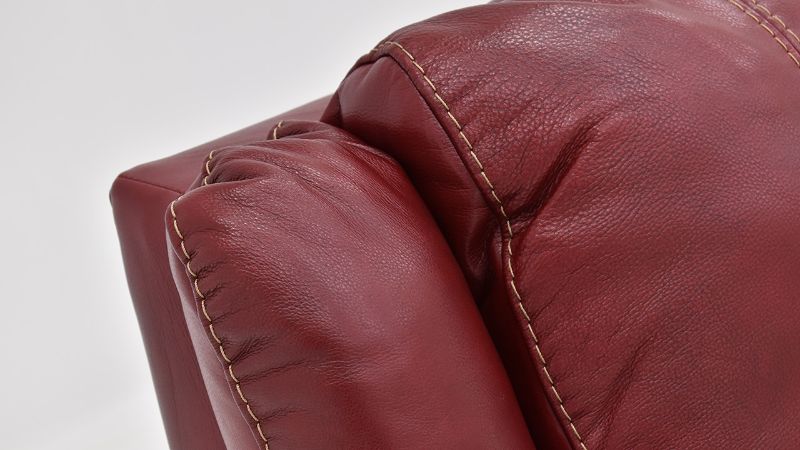Close Up View of the Mercury Reclining  Leather Sofa in Merlot Red by HomeStretch | Home Furniture Plus Bedding