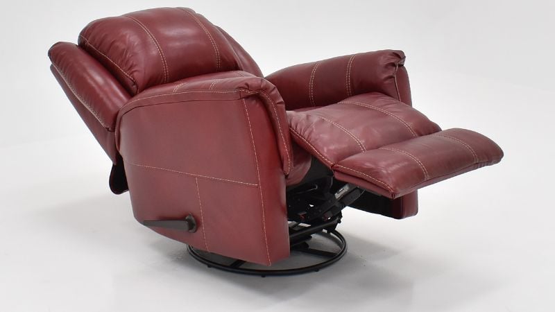 Angled View of the Mercury Swivel Glider Leather Recliner in Merlot Red by HomeStretch | Home Furniture Plus Bedding