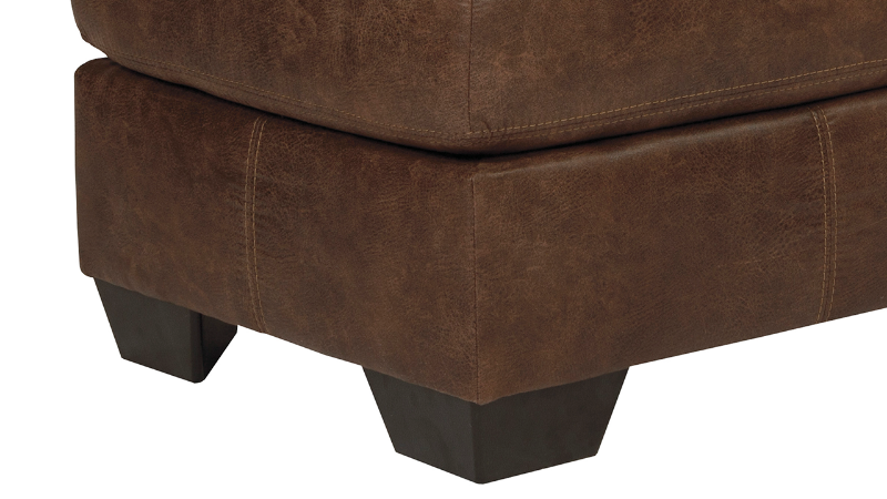 Bladen Coffee Brown Ottoman, Close Up of Bottom Corner with Foot | Home Furniture Plus Bedding