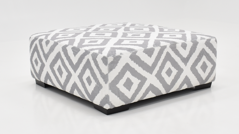 Tweed Ottoman with Gray and White Upholstery, Slightly Angled View | Home Furniture Plus Bedding