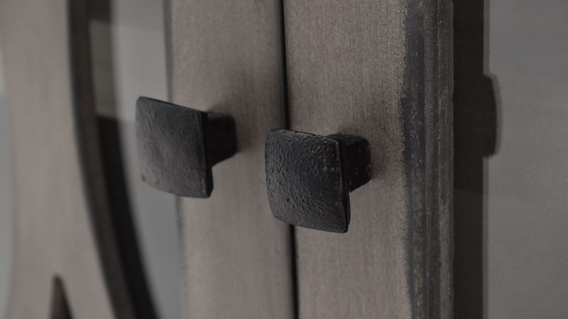 Close Up View of the Tucker Oval 2 Door Console Cabinet in Granite by Vintage Furniture | Home Furniture Plus Bedding